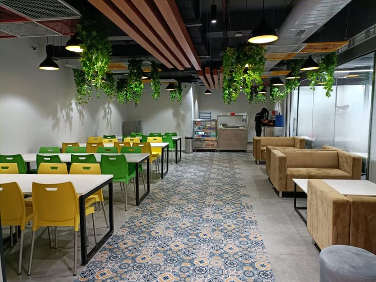 cafeteria in coworking space in the corenthum by incuspaze office spaces.jpeg
